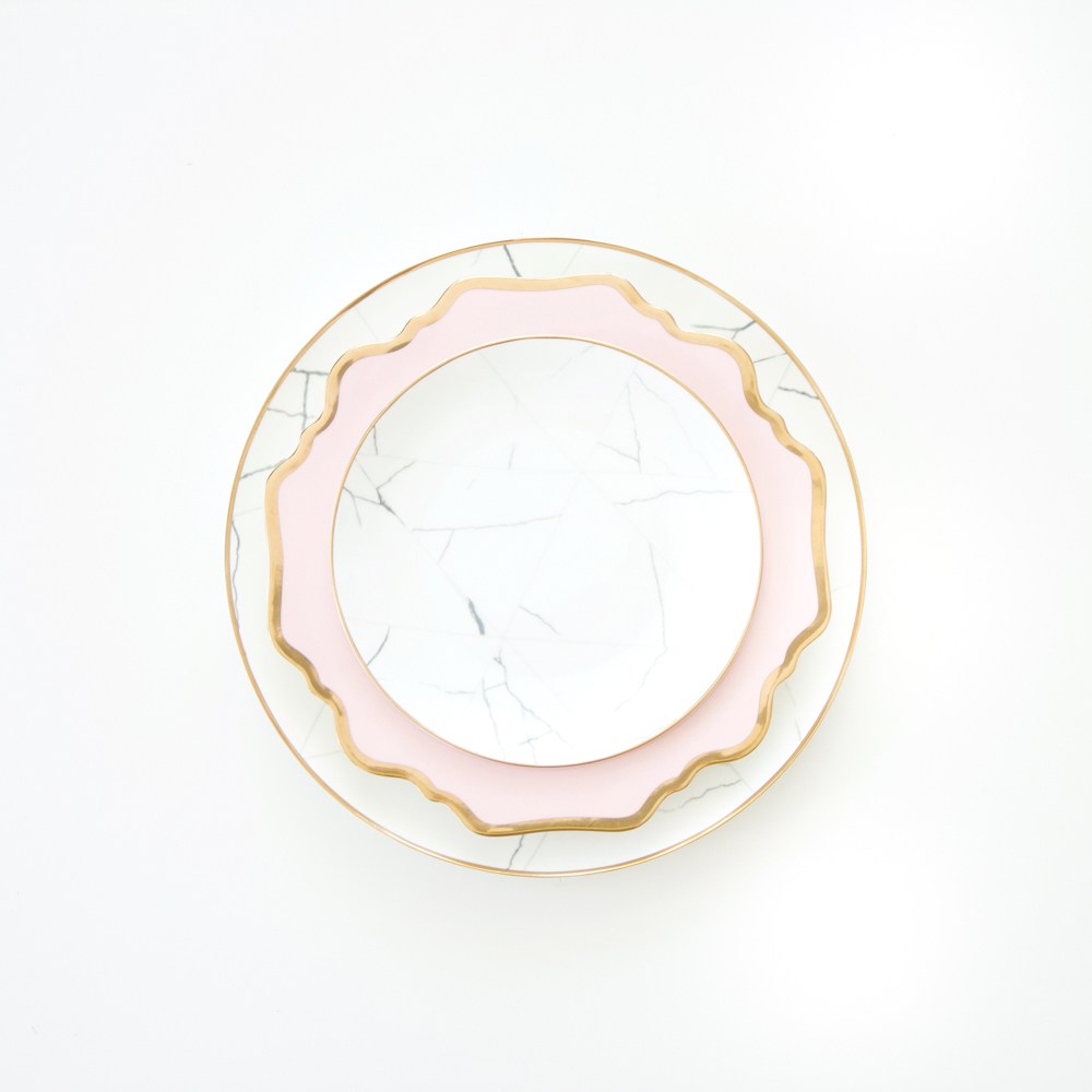 A Table to Love, Marble charger and salad plates, scalloped blush and gold details. Sophisticated tableware for sale. A Table to Love, Marble charger and salad plates, scalloped blush and gold details. Sophisticated tableware for sale.